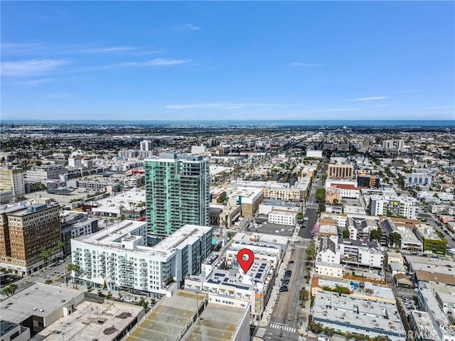 drone / aerial view featuring a city view