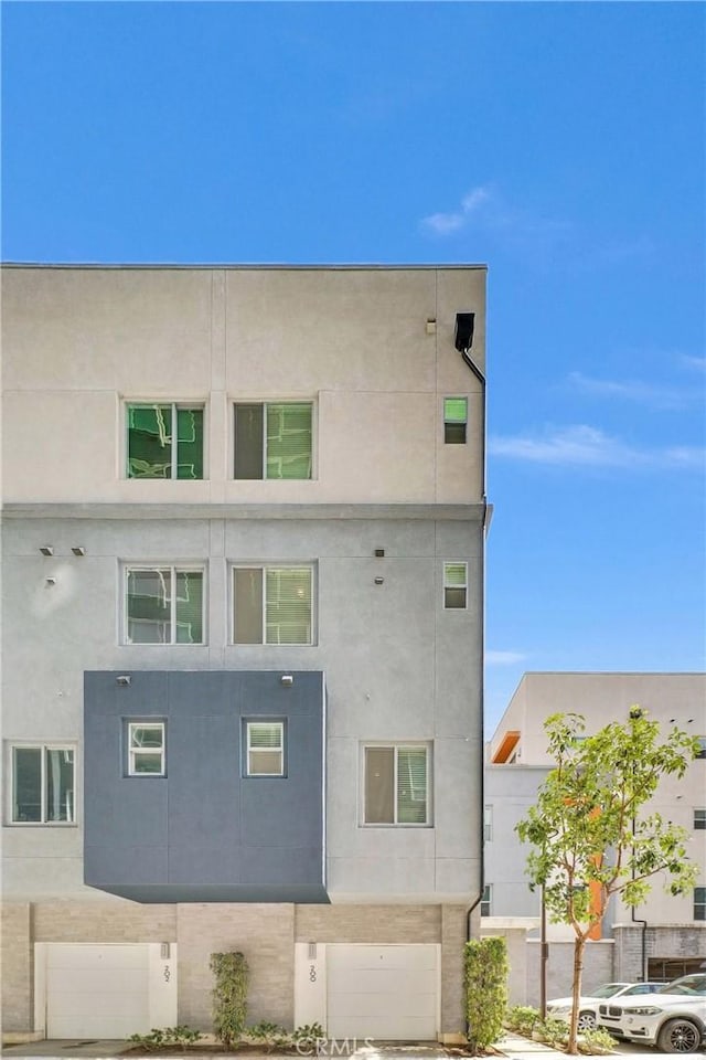 view of home's exterior with stucco siding