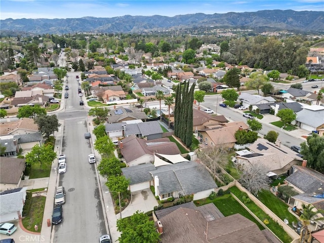 drone / aerial view with a mountain view and a residential view