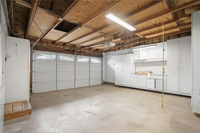 garage featuring a garage door opener