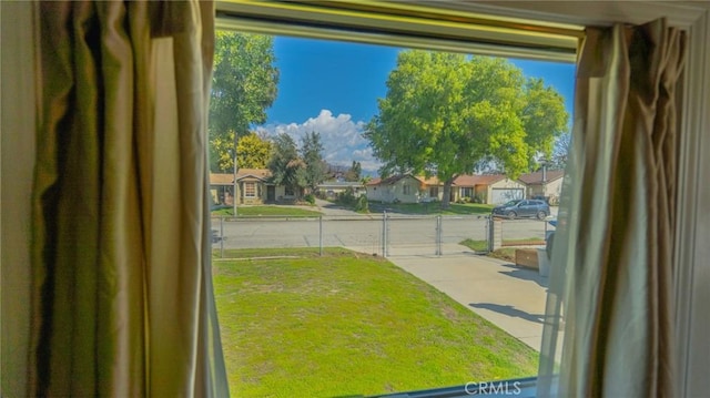 doorway to outside with a residential view