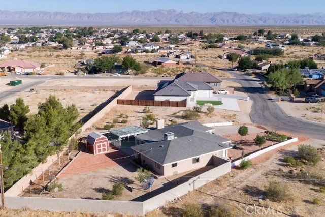 bird's eye view featuring view of desert and a mountain view