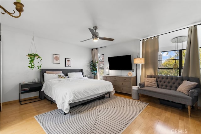 bedroom featuring a ceiling fan and light wood-style floors