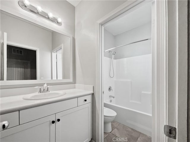 bathroom featuring vanity, toilet, visible vents, and shower / bathtub combination