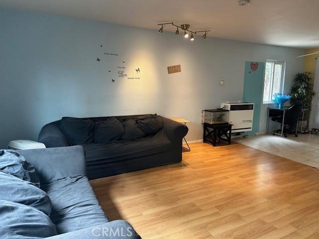 living area featuring wood finished floors