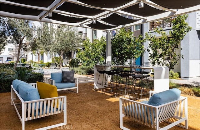 view of patio with outdoor dining space and outdoor lounge area