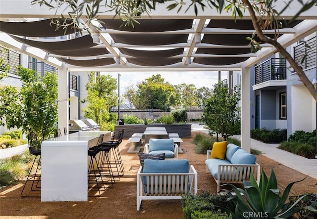 view of patio / terrace with outdoor dry bar, a grill, an outdoor hangout area, and a pergola