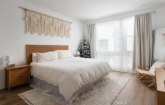 bedroom featuring wood-type flooring