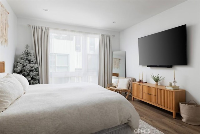 bedroom with wood finished floors