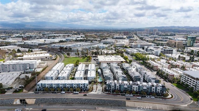 drone / aerial view featuring a city view