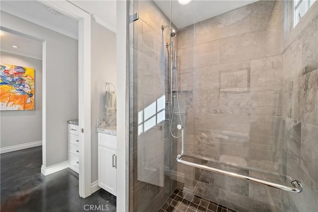 bathroom featuring vanity, recessed lighting, baseboards, and a stall shower