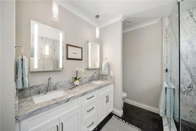 bathroom with ornamental molding, a marble finish shower, and a sink