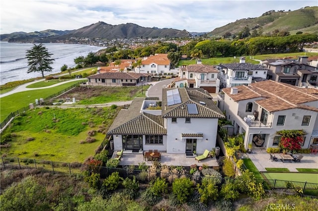 bird's eye view featuring a residential view and a water and mountain view