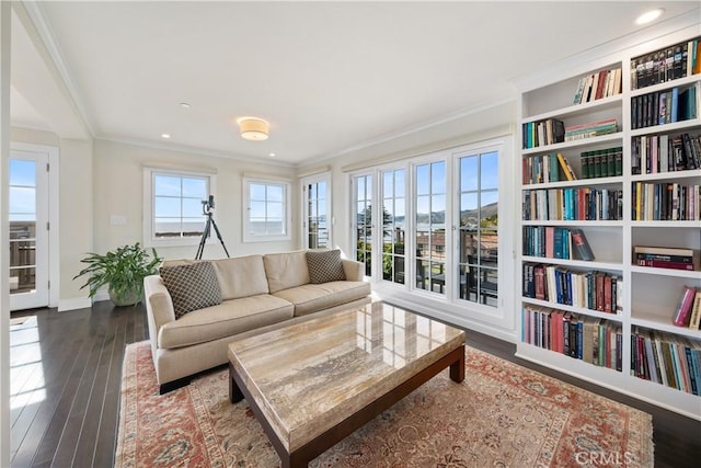 interior space with recessed lighting, baseboards, dark wood-style floors, and ornamental molding