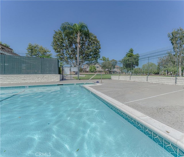 community pool with fence