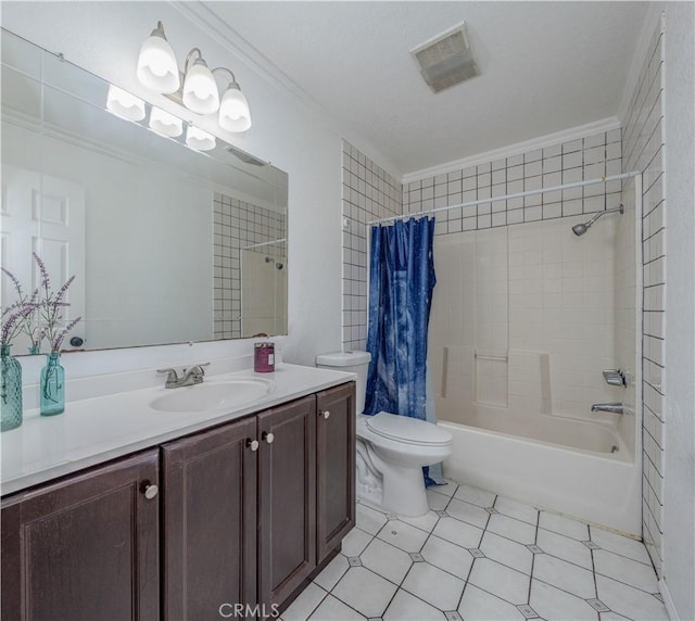 bathroom with vanity, crown molding, toilet, and visible vents