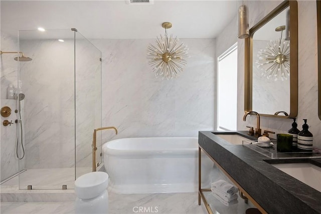 bathroom featuring a marble finish shower, visible vents, a tub to relax in, marble finish floor, and a sink