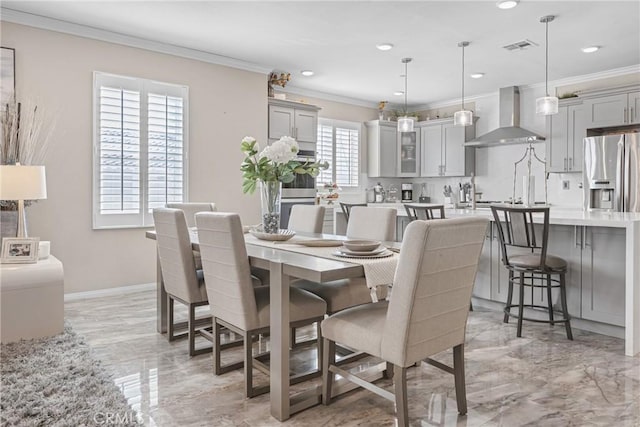 dining area featuring visible vents, baseboards, recessed lighting, ornamental molding, and marble finish floor