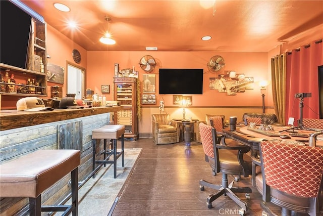 bar featuring wet bar, recessed lighting, visible vents, and hardwood / wood-style floors