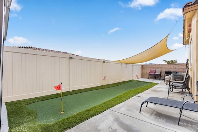 view of patio featuring a fenced backyard