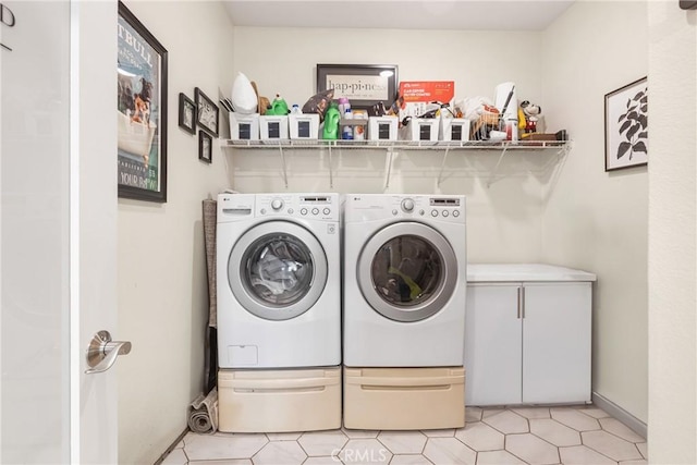 washroom featuring independent washer and dryer