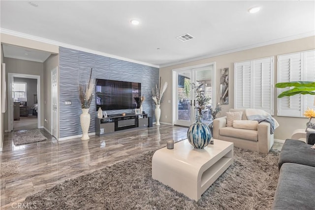 living room with visible vents, plenty of natural light, and baseboards