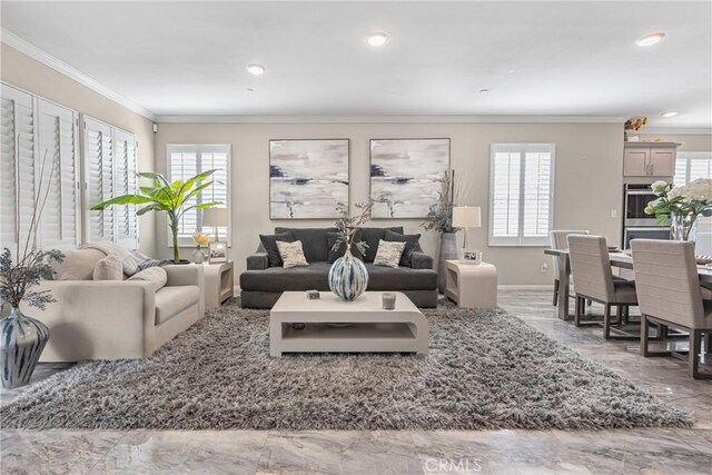 living area with crown molding, recessed lighting, and baseboards