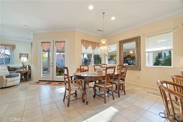 dining space with baseboards, a chandelier, ornamental molding, light tile patterned floors, and recessed lighting