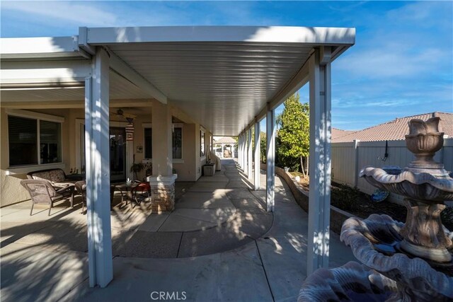 view of patio / terrace with fence