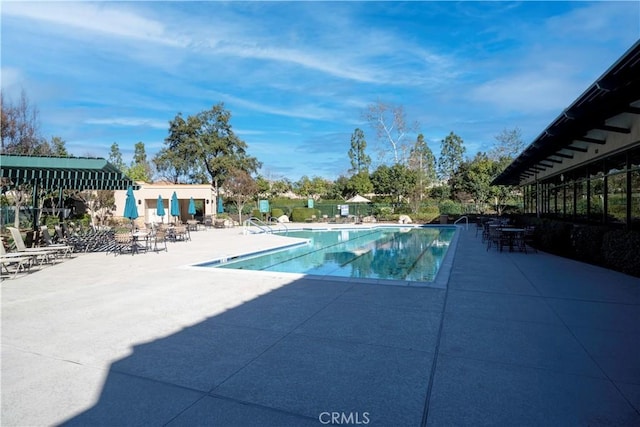 community pool with a patio