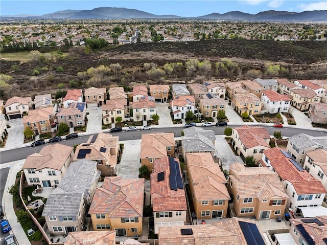 bird's eye view featuring a residential view and a mountain view