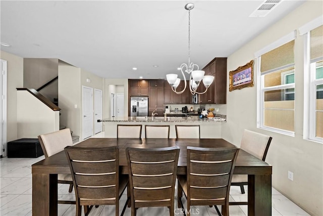 dining area with stairway, visible vents, recessed lighting, a notable chandelier, and marble finish floor