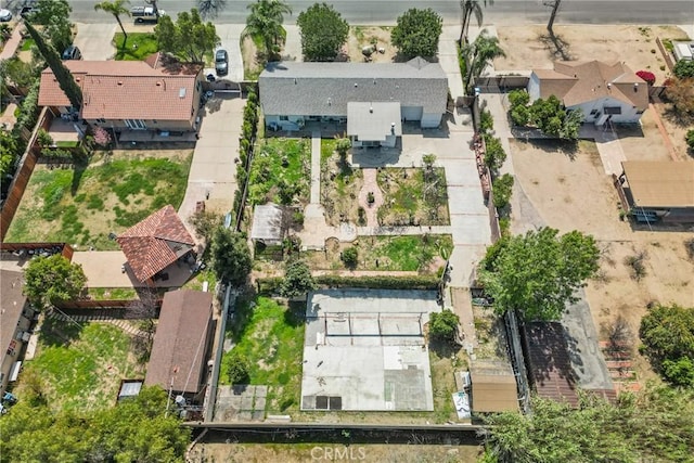 birds eye view of property with a residential view