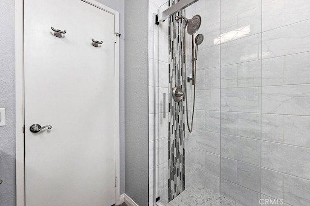 bathroom with a stall shower