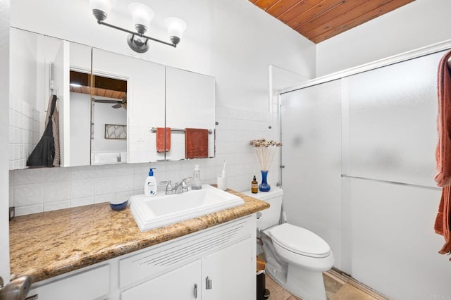 full bathroom with toilet, a stall shower, tile walls, wooden ceiling, and vanity