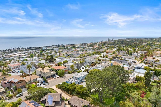 birds eye view of property featuring a water view and a residential view