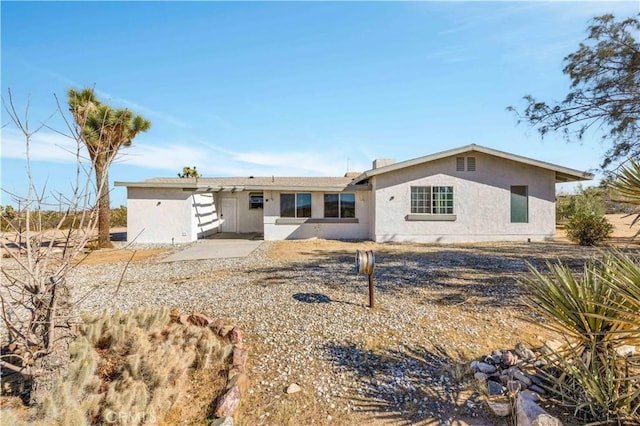 single story home with stucco siding