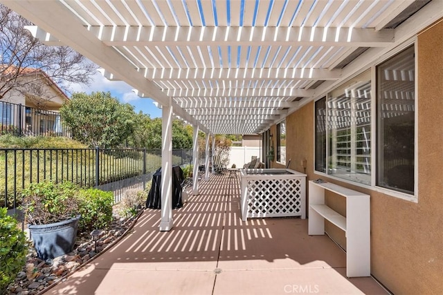 view of patio with a pergola and a fenced backyard