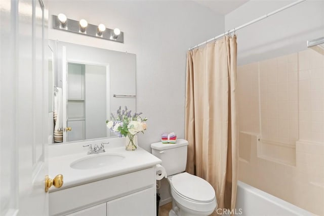 bathroom with toilet, vanity, and shower / tub combo with curtain