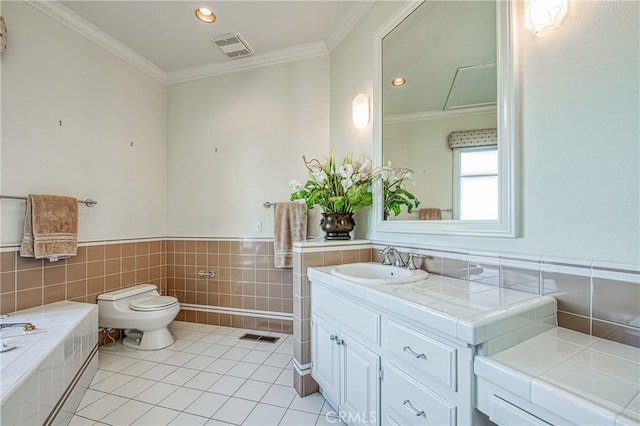 bathroom with tile patterned flooring, visible vents, toilet, ornamental molding, and tile walls