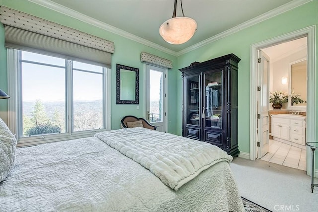 50369 Rd 420, Coarsegold, CA 93614 - bedroom featuring multiple windows, ornamental molding, carpet floors, a sink, and baseboards