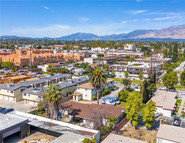 drone / aerial view with a residential view and a mountain view