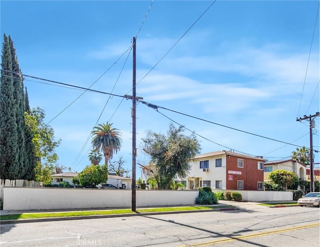 view of street featuring curbs and sidewalks