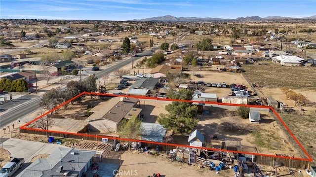 bird's eye view featuring a mountain view and view of desert