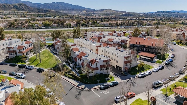 aerial view with a mountain view and a residential view