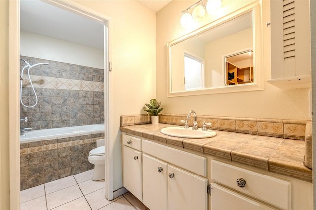 27666 Nugget Dr Unit 3, Canyon Country, CA 91387 - full bath with tile patterned floors, toilet, tiled shower / bath, and vanity