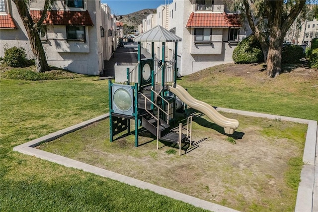 27666 Nugget Dr Unit 3, Canyon Country, CA 91387 - community play area with a yard and a residential view