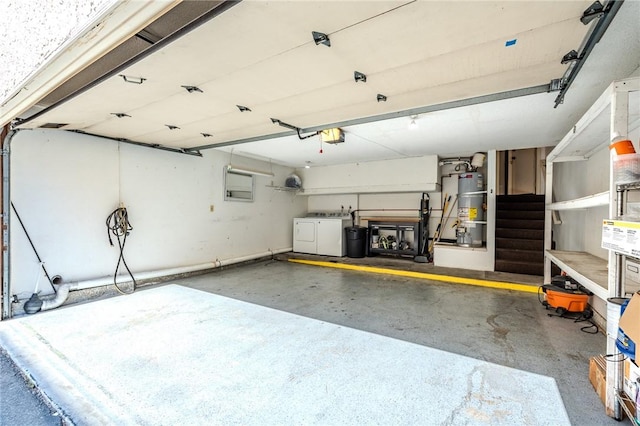 27666 Nugget Dr Unit 3, Canyon Country, CA 91387 - garage featuring independent washer and dryer, water heater, and a garage door opener
