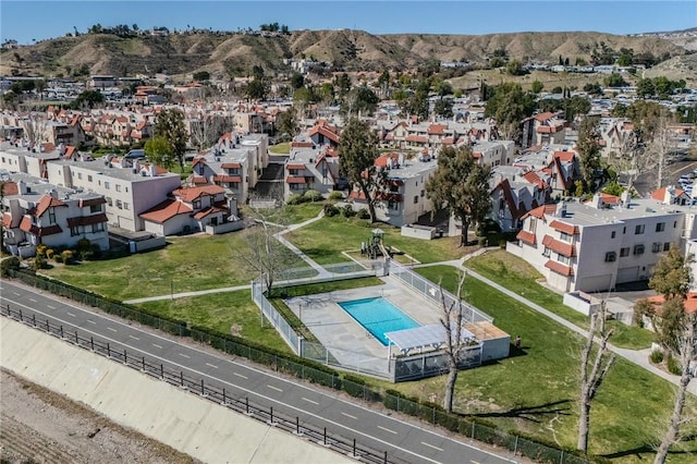 27666 Nugget Dr Unit 3, Canyon Country, CA 91387 - aerial perspective of suburban area with a pool and a mountain backdrop