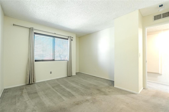 27666 Nugget Dr Unit 3, Canyon Country, CA 91387 - carpeted empty room with a textured ceiling and baseboards